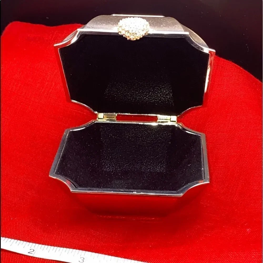 Small square metal trinket box with hinged lid with no makers mark